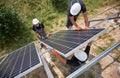 Workers mounting photovoltaic solar panel system Royalty Free Stock Photo