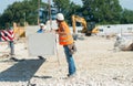 Workers operating in contruction building site Royalty Free Stock Photo