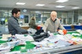 workers operating conveyor belt in recycling factory Royalty Free Stock Photo