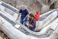 Workers are placing set of Styrofoam thermal insulation on new p