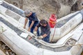 Workers are placing set of Styrofoam thermal insulation on new p