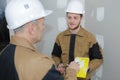 Workers at plastering facade work Royalty Free Stock Photo