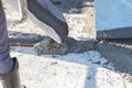 Worker pouring concrete mix at home foundation Royalty Free Stock Photo