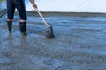 Workers pour the Foundation for the construction of a residential building using mobile concrete mixers. Royalty Free Stock Photo