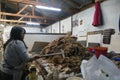 Workers process pulp at a small paper factory