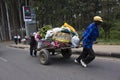 Workers pull wooden handcart Royalty Free Stock Photo