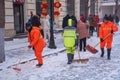 Workers remove snow
