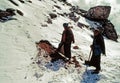 Workers Removing Snow from Rad at Selapass weather at Se La top