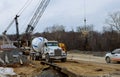 Workers repair the make road machinery equipment for road repair industry Royalty Free Stock Photo