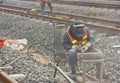 Workers repair the railway with Sandblasted.