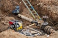 Workers of the repair team excavated pipeline