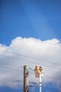 Workers Repairing Faulty Electric Power Lines Royalty Free Stock Photo