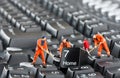 Workers repairing keyboard Royalty Free Stock Photo