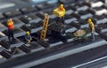 Workers repairing keyboard Royalty Free Stock Photo