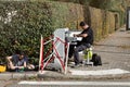 Workers repairing relationship communications cable connection