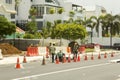 Workers repairing road in Singapore Royalty Free Stock Photo