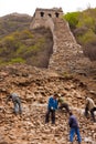 Workers repairs the ruins of the Great Wall Royalty Free Stock Photo
