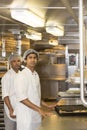 Workers in restaurant kitchen