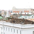 Workers restore roof of public building in center of metropolis. repairing building roof. Omsk, 27.10.2020 Royalty Free Stock Photo