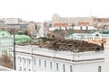 Workers restore roof of public building in center of metropolis. repairing building roof. Omsk, 27.10.2020 Royalty Free Stock Photo