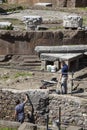 Workers restorers. Republican Roman temples, and the remains of Pompeys Theatre Royalty Free Stock Photo