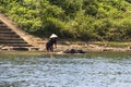 Workers on river in Vietnam Royalty Free Stock Photo