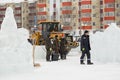 Workers shovels to remove the snow on the ice town Royalty Free Stock Photo