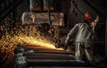 The workers in the steel mill are burnishing the steel Royalty Free Stock Photo