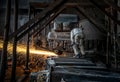 The workers in the steel mill are burnishing the steel Royalty Free Stock Photo