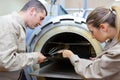 workers taking sheet metal from kiln Royalty Free Stock Photo