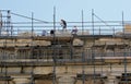 Workers and technicians during restoration works on the roof of Parthenon temple