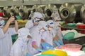 Workers are testing the color of pangasius fish in a seafood processing plant in Tien Giang, a province in the Mekong delta of Vie Royalty Free Stock Photo