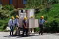 Workers transport the furniture frame to public shells!