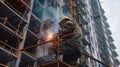 workers in uniform and protective masks are welding the structure on the construction Royalty Free Stock Photo