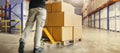Workers Unloading Packaging Boxes on Pallet in Storage Warehouse. Cardboard Boxes. Shipping Supplies Warehouse. Shipment Boxes. Royalty Free Stock Photo