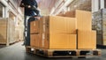 Workers Unloading Packaging Boxes on Pallet in Warehouse. Electric Forklift Loader. Cartons Cardboard Boxes. Supplies Logistics Royalty Free Stock Photo