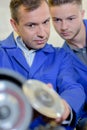 workers using circular blades