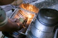 Workers using a metal grinding machines to cut workpieces made o