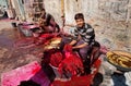 Workers of a village textile factory paint clothing