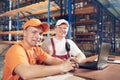 Workers in warehouse Royalty Free Stock Photo