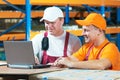 Workers in warehouse Royalty Free Stock Photo