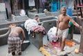 Workers washing clothes at Dhobi Ghat in Mumbai, India Royalty Free Stock Photo