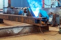 Workers at work, ongoing welding operation Royalty Free Stock Photo
