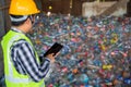 A workers work on recycle waste, Recycling Analyst looking at recycling waste To proceed to the next process Royalty Free Stock Photo