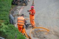 Workers at work to bury the cables of the ultra-fast network