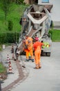 Workers at work to bury the cables of the ultra-fast network