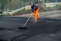 Workers at work to redo the road surface