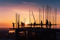 Workers working on construction site at sunrise. Generative AI Royalty Free Stock Photo