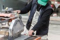 Workers are working, cutting marble cutter