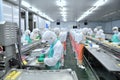 Workers are working a production line in a seafood factory in Ho Chi Minh city, Vietnam